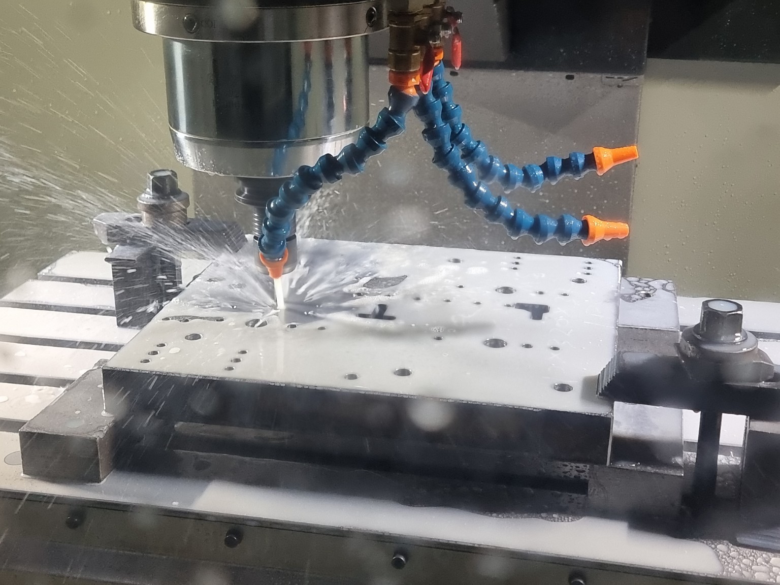 CNC machining in progress at DCM Tooling