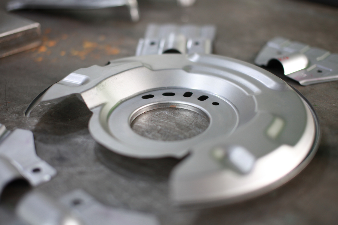 Stamped metal component
